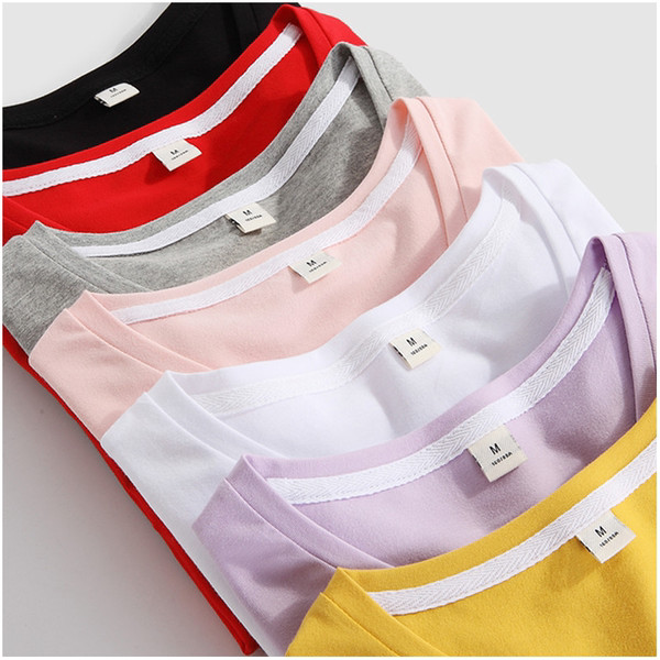 Bluză din bumbac de culoare uni cu decolteu spitz sau oval