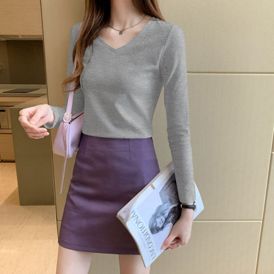 Ženska jednobojna bluza dugih rukava dva modela sa ovalnim i V izrezom