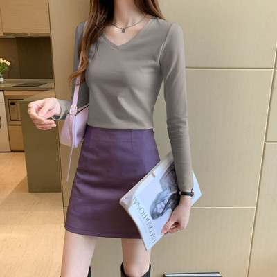 Ženska jednobojna bluza dugih rukava dva modela sa ovalnim i V izrezom