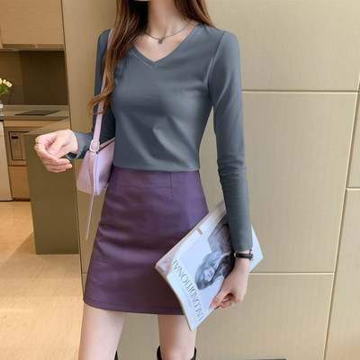 Ženska jednobojna bluza dugih rukava dva modela sa ovalnim i V izrezom