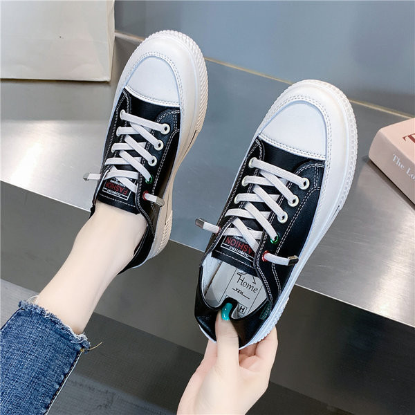 Ženske tenisice s vezicama u bijeloj i crnoj boji