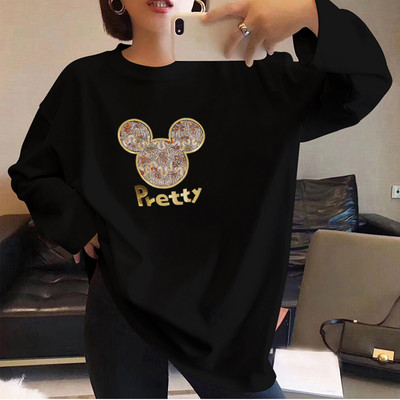 Γυναικεία φαρδιά μπλούζα με στρογγυλή λαιμόκοψη και απλικέ