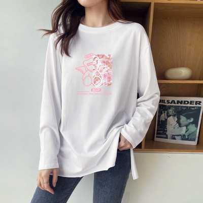 Φαρδιά ασύμμετρη μπλούζα με σκισίματα στο πλάι