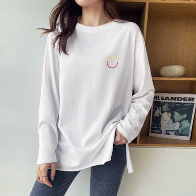 Φαρδιά ασύμμετρη μπλούζα με σκισίματα στο πλάι