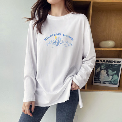 Φαρδιά ασύμμετρη μπλούζα με σκισίματα στο πλάι