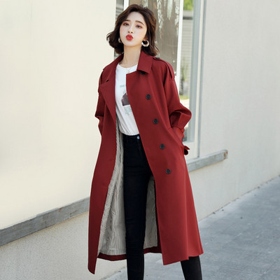 Elegantni ženski dugi kaput slim modela s remenom i gumbima