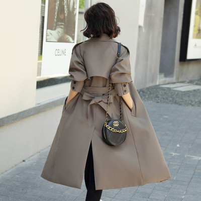 Elegantni ženski dugi kaput slim modela s remenom i gumbima