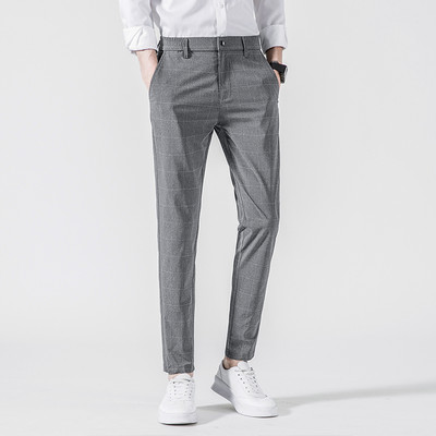 Sportsko-elegantne muške hlače s džepovima u sivoj i crnoj boji