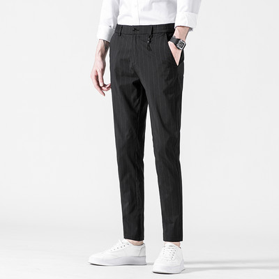 Sportsko-elegantne muške hlače s džepovima u sivoj i crnoj boji