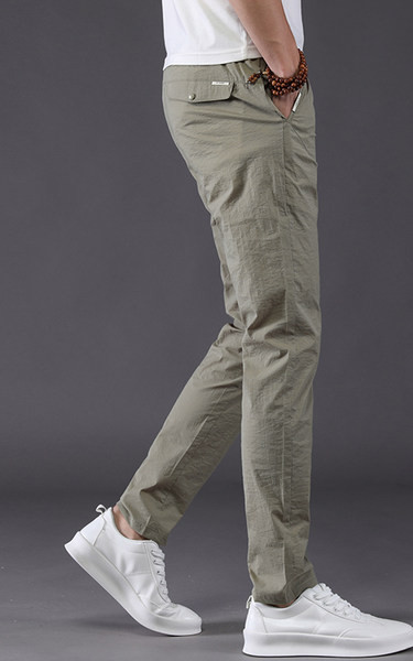 Vöökohal lipsudega õhukesed sportlikud vabaaja püksid