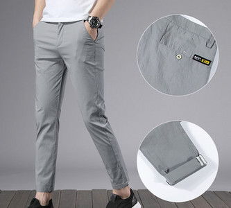 Meeste moodsad taskutega püksid mitmes värvitoonis