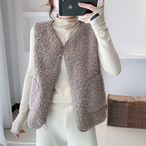 Uus mudel taskutega naiste plüüsist vest