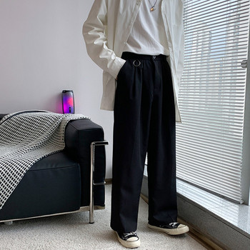 Широк мъжки панталон с джобове в черен цвят