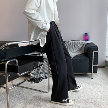 Φαρδύ ανδρικό παντελόνι με τσέπες σε μαύρο χρώμα