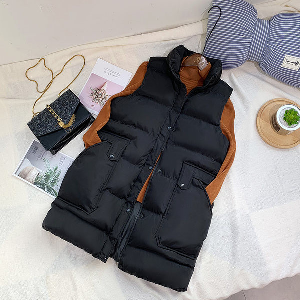 Vesta toamna-iarna cu lungime medie si buzunare mari