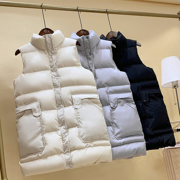 Vesta toamna-iarna cu lungime medie si buzunare mari