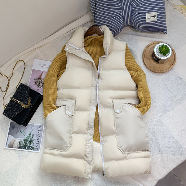 Vesta toamna-iarna cu lungime medie si buzunare mari