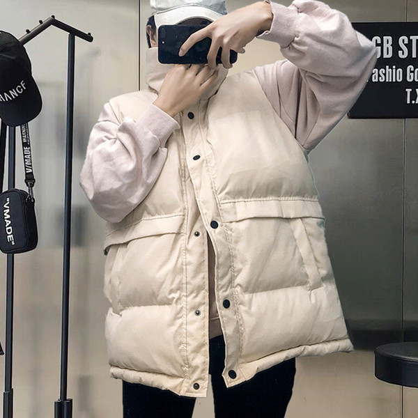 Vestă modernă de damă cu buzunare și nasturi la guler înalt