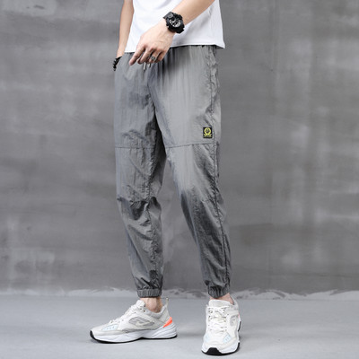 Model larg de pantaloni barbatesti cu broderie