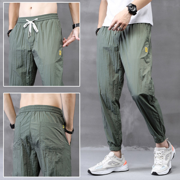 Model larg de pantaloni barbatesti cu broderie