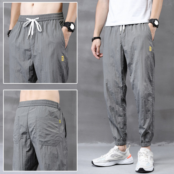 Model larg de pantaloni barbatesti cu broderie