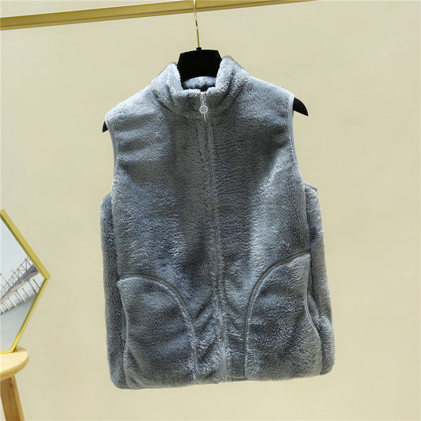 Vestă pufoasă cu fermoar și buzunare