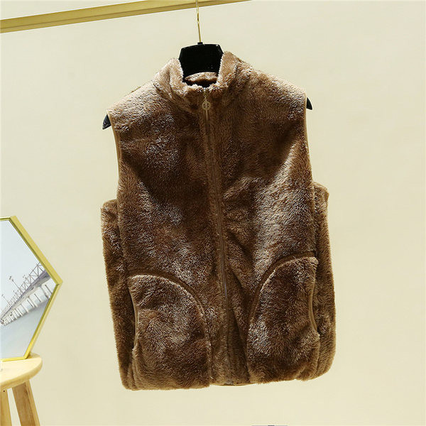 Vestă pufoasă cu fermoar și buzunare