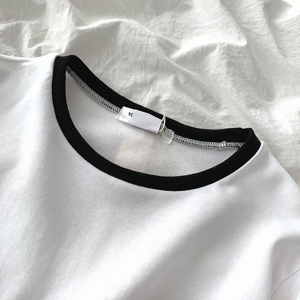 Bluză scurtă din bumbac cu decolteu oval și mâneci lungi