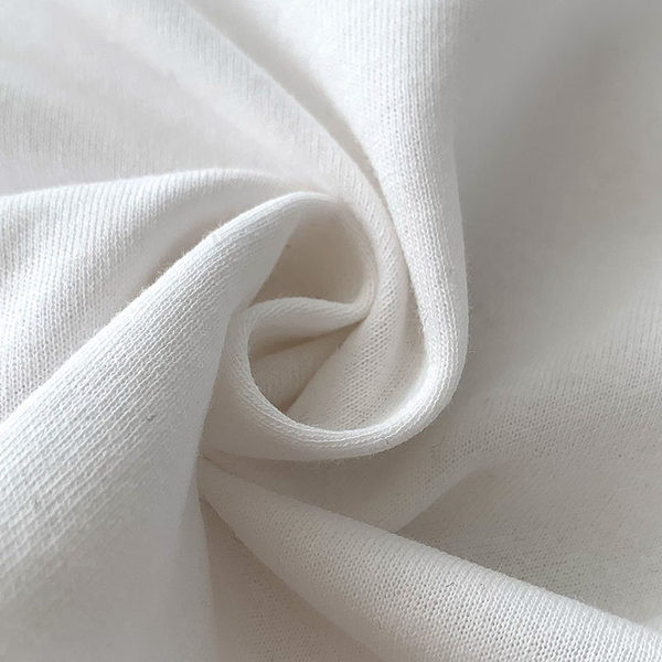 Bluză scurtă din bumbac cu decolteu oval și mâneci lungi