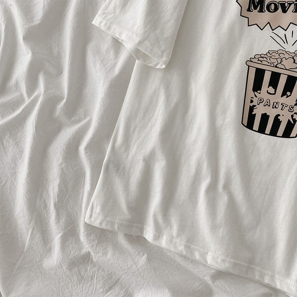 Široka pamučna majica s aplikacijom za ljeto