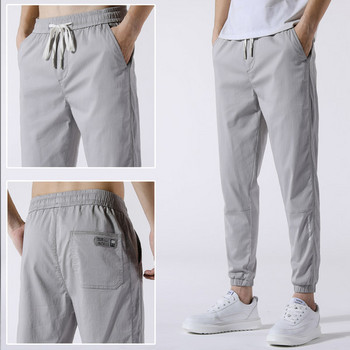 Мъжки ежедневен панталон с връзки и джобове - сив цвят 