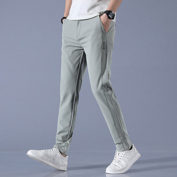 Мъжки спортно-елегантен панталон с джобове и надпис