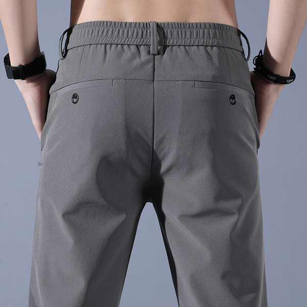 Pantaloni de bărbați sport-eleganți cu buzunare și inscripție