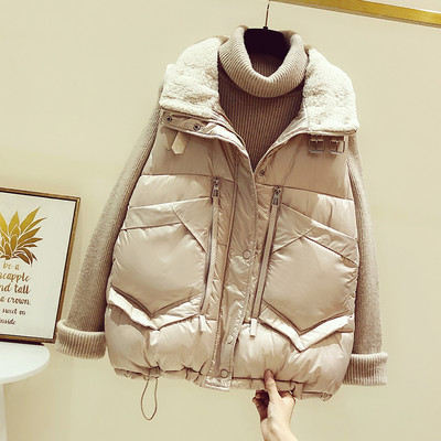 Široki ženski prsluk s džepovima i patentnim zatvaračima