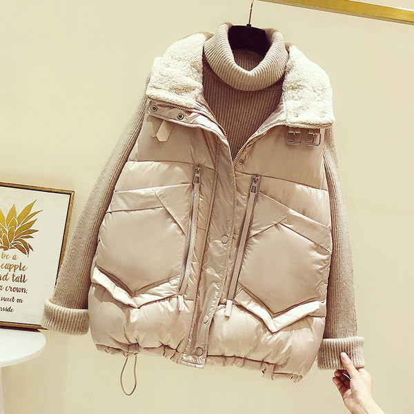 Široki ženski prsluk s džepovima i patentnim zatvaračima