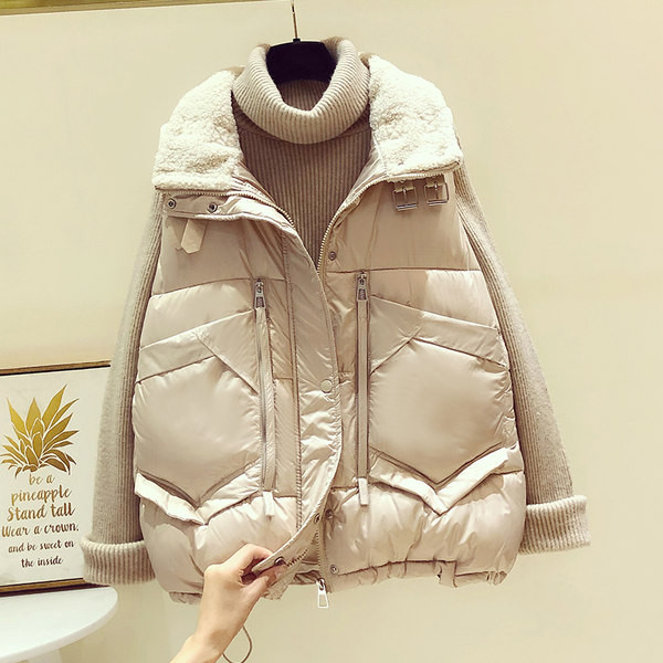 Široki ženski prsluk s džepovima i patentnim zatvaračima