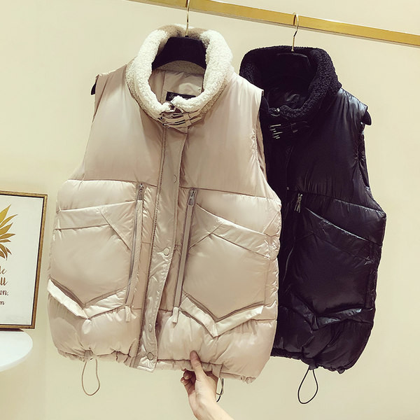 Široki ženski prsluk s džepovima i patentnim zatvaračima