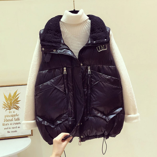 Široki ženski prsluk s džepovima i patentnim zatvaračima