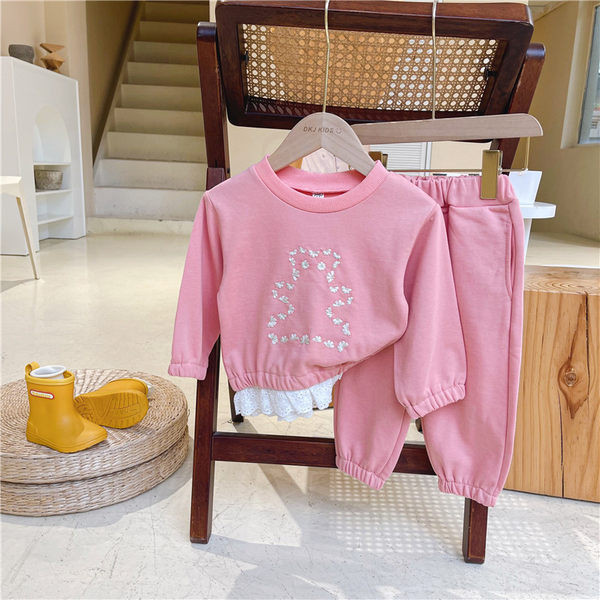 Set pentru copii din doua piese bluza cu broderie si pantaloni cu buzunare