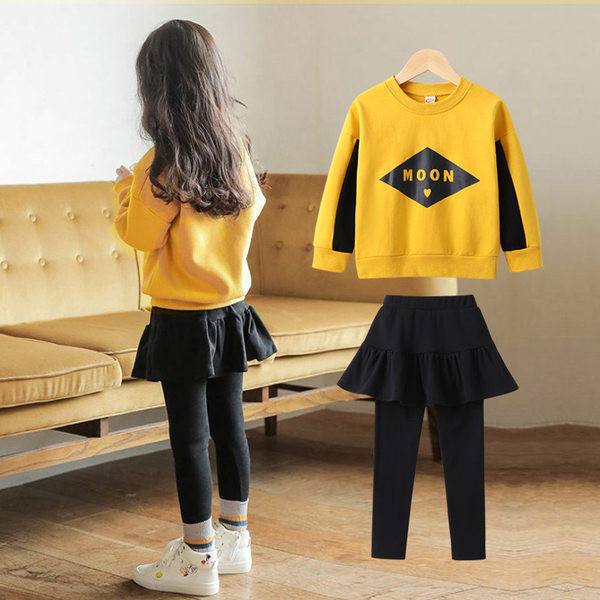 Set copii pentru fete din două părți - bluză cu mâneci lungi și fustă-pantaloni