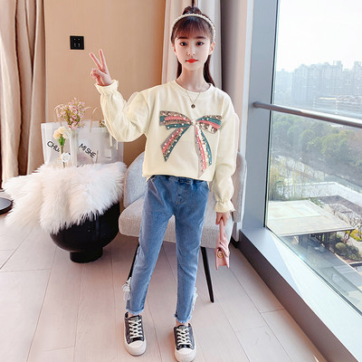 Κοριτσίστικο σετ μπλούζα και τζιν με σκισμένα μοτίβα