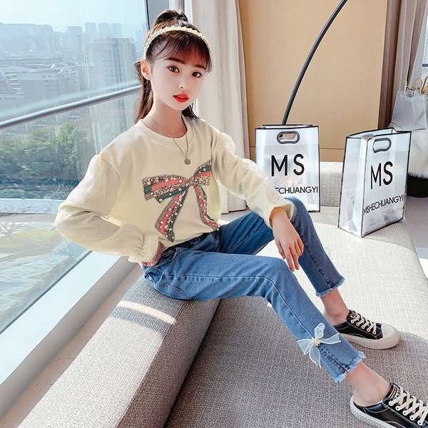 Κοριτσίστικο σετ μπλούζα και τζιν με σκισμένα μοτίβα