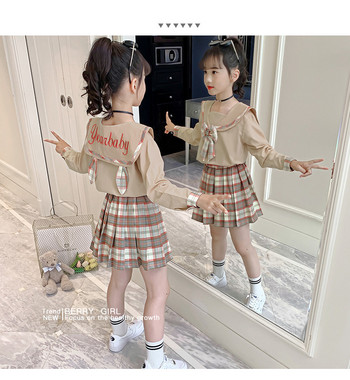 Модерен сет за момичета от две части - блуза и панталон каре или блуза и пола каре