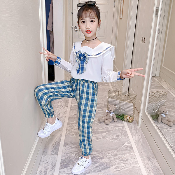 Μοντέρνο σετ για κορίτσια σε δύο μέρη - μπλούζα και καρό παντελόνι ή μπλούζα και καρό φούστα
