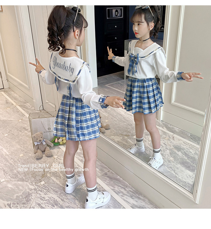 Μοντέρνο σετ για κορίτσια σε δύο μέρη - μπλούζα και καρό παντελόνι ή μπλούζα και καρό φούστα