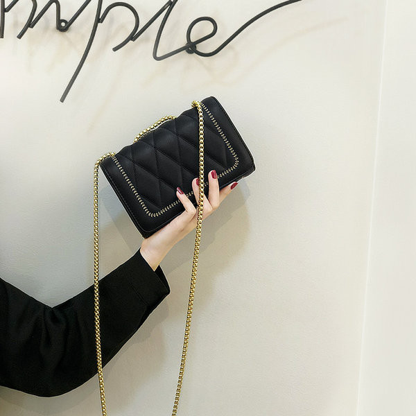 Ženska svakodnevna torba s metalnim lancem u crnoj i zelenoj boji