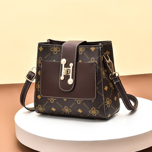 Elegantna ženska torba s kopčom od umjetne kože