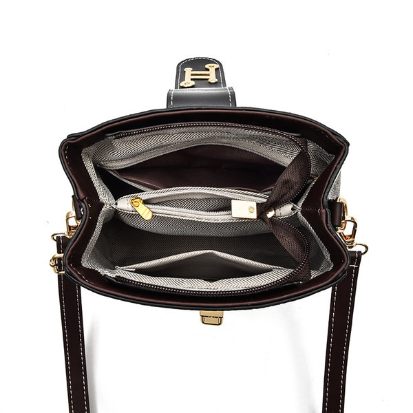 Elegantna ženska torba s kopčom od umjetne kože