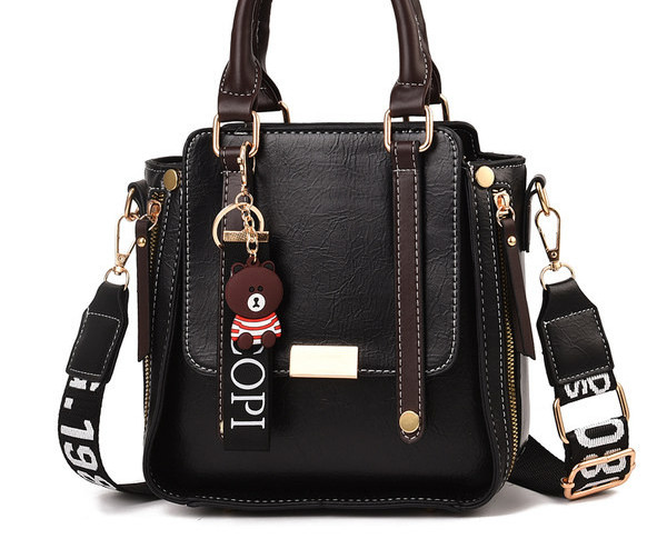 Moderna ženska torba s kratkom i dugom ručkom i patentnim zatvaračem