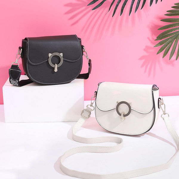 Moderna ženska torba s tekstilnom ručkom i metalnom kopčom - dva modela